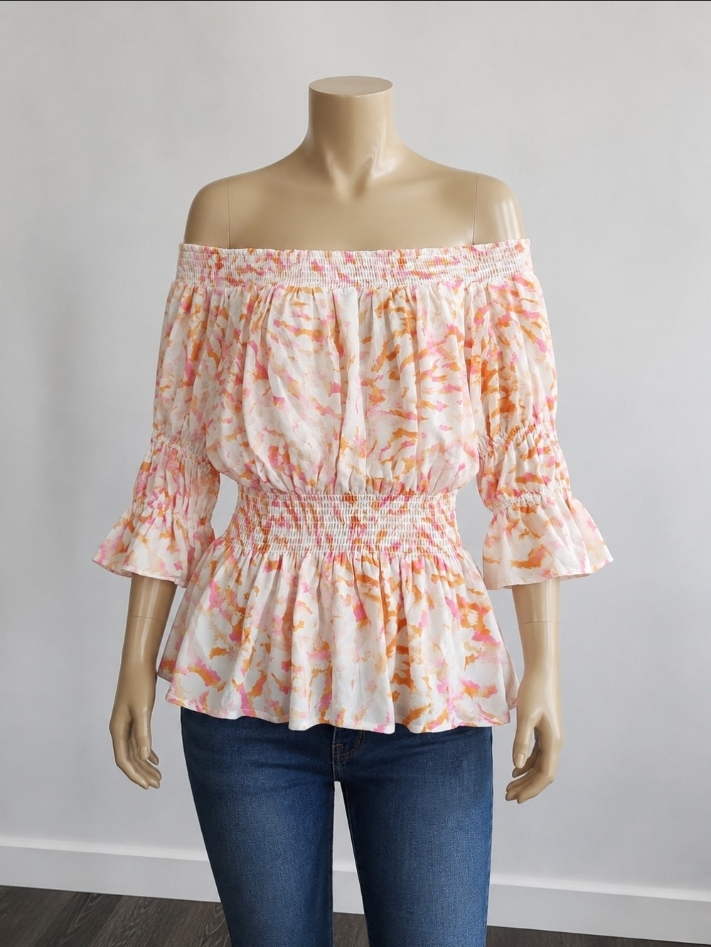 CAbi Off-Shoulder Smocked Waist Blouse in Pink & Orange Print